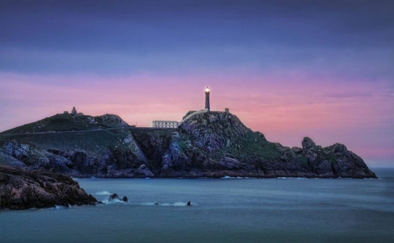 114. Cabo e faro Vilán ao solpor